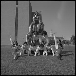 [Cheerleaders pose in pyramid, 2]