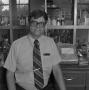 Photograph: [Faculty member in the chemistry lab]