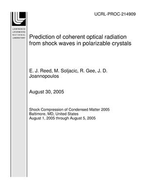 Prediction of coherent optical radiation from shock waves in polarizable crystals