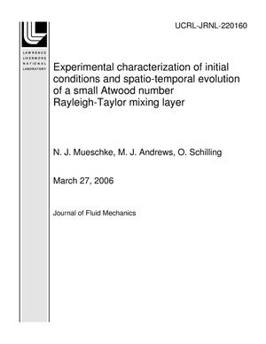 Experimental characterization of initial conditions and spatio-temporal evolution of a small Atwood number Rayleigh-Taylor mixing layer