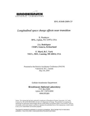 Longitudinal space charge effects near transition