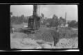 Primary view of [An excavator on a construction site]