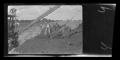Photograph: [Photo of men working on a pipeline]