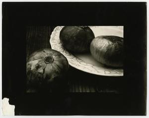 [Photograph of three onions]