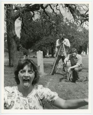 [Woman making silly face to photographer]