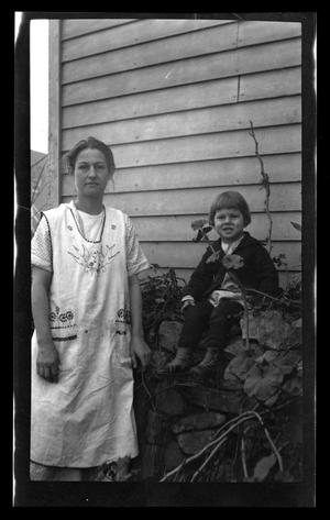 [Irene Williams posing with her son Charles]