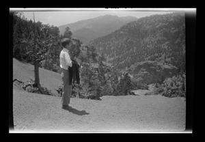 [One of the Williams boys looking out over a valley]