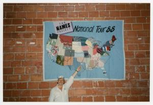 [Worker Pointing At The Names Project National Tour 88 Quilt Map]