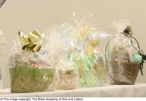 [Gift baskets on table]
