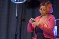 Primary view of [Kim Fields in a Pink Wig On-Stage]