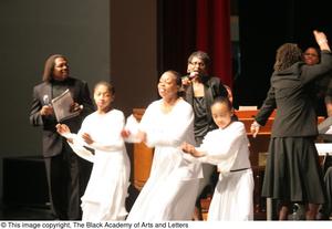[Curtis King on Stage with Worship Dancers]