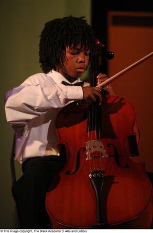 [Young Musician Playing the Cello]