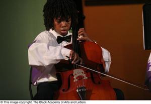 [Young Musician Playing Cello]