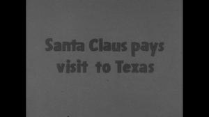 [News Clip: Santa Claus pays visit to Texas]