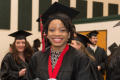 Thumbnail image of item number 1 in: '[Young Woman Smiles for Photo at the Fall 2014 Undergraduate Commencement Ceremony]'.
