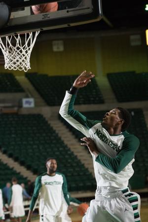 Primary view of object titled '[UNT Basketball Player Armani Flannigan]'.