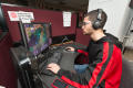 Thumbnail image of item number 1 in: '[Student playing a computer game, 2]'.