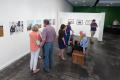 Primary view of [Exhibition Attendees Conversing]