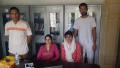Photograph: Photograph of Sadaf Munshi with Khawaja Rehman & participants of ling…