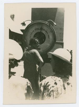 [Photo of the weight guessing game from the Byrd Williams III scrapbook]