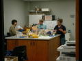 Photograph: [Student Employees Eating in Breakroom]