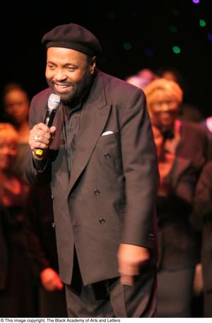 [Andraé Crouch Performing]