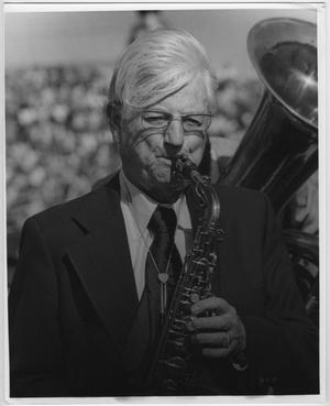 [Man playing saxophone in 1981 North Texas Alumni Band]