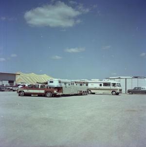 [Photograph of R.V. and Trailer]