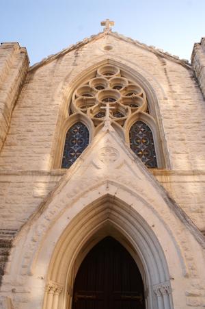 [The rose window and entryway of St. Patrick's Catholic Cathedral]