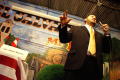 Photograph: [Speaker addresses the crowd at the El Salvador Restaurant]