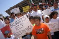 Thumbnail image of item number 1 in: '[Family groups hold up signs during protest at Dallas City Hall]'.