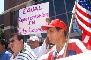 Primary view of object titled '[Protesters with sign, "Equal Representation in City Council"]'.