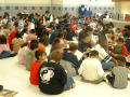 Photograph: [Students read books in a group at Seminary Hills Elementary]