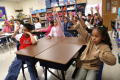 Thumbnail image of item number 1 in: '[Students respond during a third grade class in Crockett Elementary]'.
