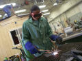 Photograph: [Student works on a welding project]
