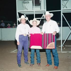 [Three people in Youth division award presentation at Will Rogers Coliseum]