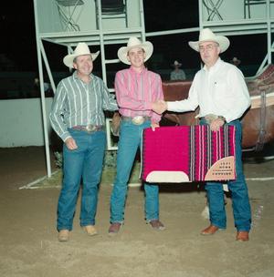 [Three men in Youth division award presentation at Will Rogers Coliseum]