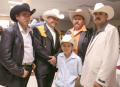 Thumbnail image of item number 1 in: '[Four men and a boy wearing cowboy hats]'.