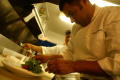 Photograph: [Chef preparing micro vegetable salad]