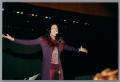 Thumbnail image of item number 1 in: '[Tanya Blount holds out arms while singing]'.