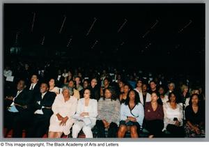 [audience members at the gala]